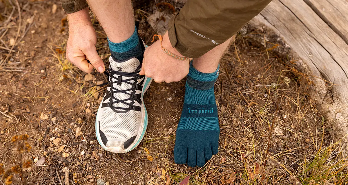 Putting on shoes over the top of the Injinji toe socks